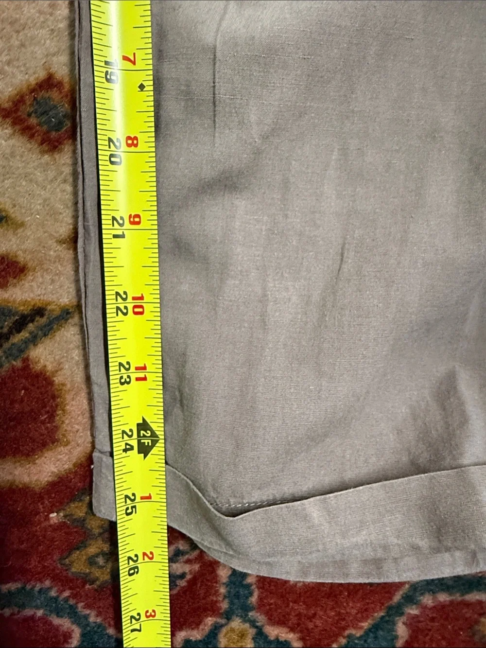 AllSaints trousers with a pleated front and a button closure